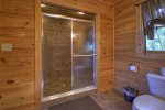 Loft Master Bathroom with a Large Walk In Tile Shower 